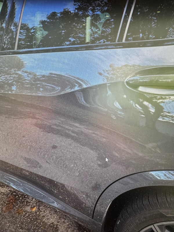 Réparation de rayure de vandalisme sur porte BMW X5